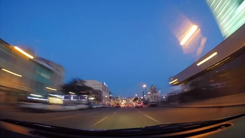 Go pro timelapse view from car driving in the night city and Macdonalds auto Stock Footage 121380327