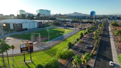 Go Sun Devils sign at Arizona State University sport complexes. Aerial Stock Footage 248128318