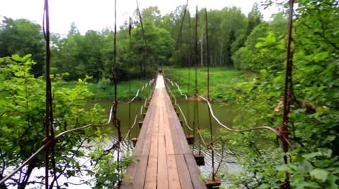 Go to the suspension bridge over the river Video stock 39841013