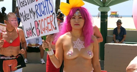 Go Topless Day pride parade activists celebrating gender equality in LA, 4K Stock Footage 114845446