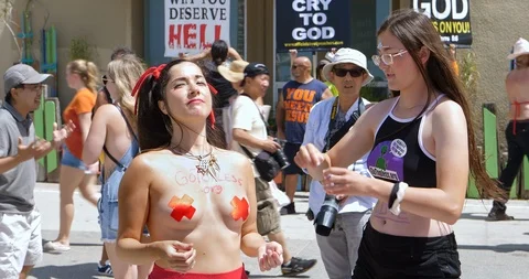 Go Topless Day pride parade activists celebrating gender equality in LA, 4K Stock Footage 114857807