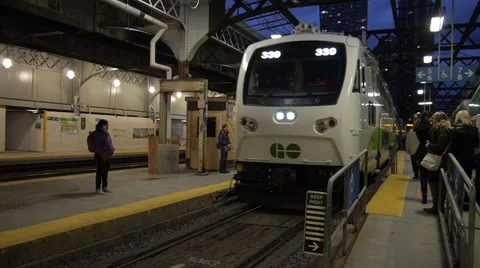 GO Train arriving at Union train station - Toronto, Ontario, Canada Stock Footage 68999653