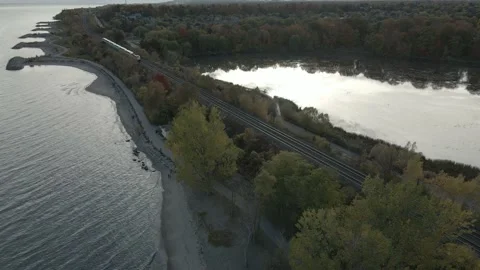 GO Train crossing the Rouge River Lake Stock Footage 145957734