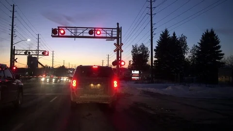 Go Train goes through Crossing Stock Footage 70815350