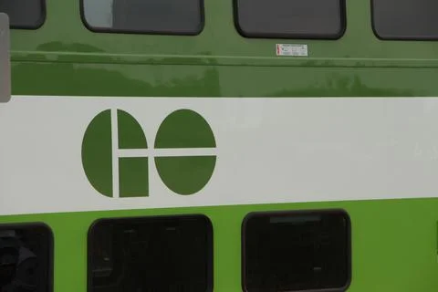 Go train transit mass transportation system green logo on white background Stock Photos