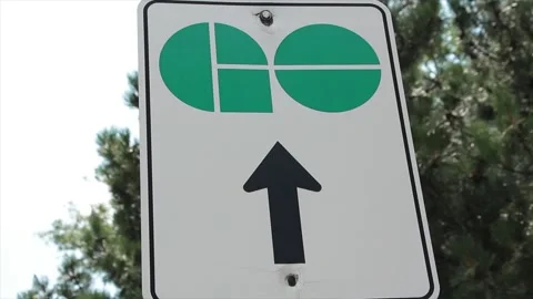 Go train vertical rectangle sign logo with arrow pointing up with pine tree Video stock 248252709