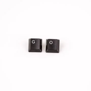 Go word written with black computer buttons over white Stock Photos