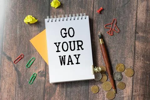 GO YOUR WAY text on torn paper. Stock Photos