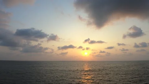 Goa beautiful sunset view. Sun go down, blue and orange clouds flow in sky. Maje Stock Footage 141382073