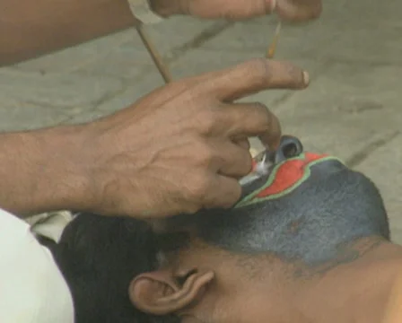 Goa / Cochin Kathakali Dancer having makeup applied Stock Footage