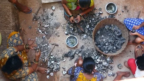 GOA, India  DEC, 2016: Indian Womens cleaning mussels after fishing. Stock Footage 74674325