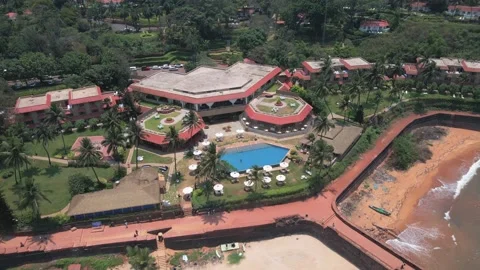 Goa Sinquerim Beach drone bird's eye view Taj Fort Aguada  drone going away Stock-Footage 153011652