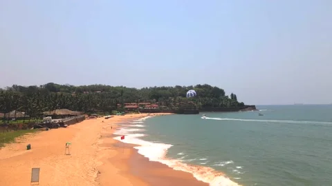 Goa Sinquerim Beach drone shot paragliding bird's eye view Stock-Footage 153011914
