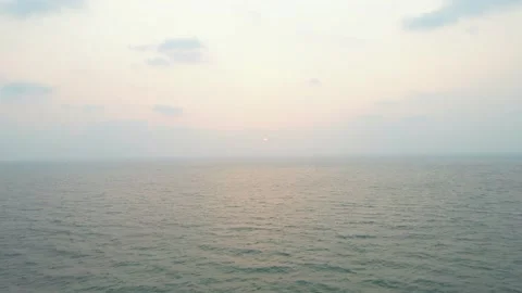 Goa Sinquerim Candolim Beach drone birds-eye view into the sunset sun rise Stock-Footage 153184404
