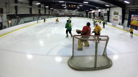 Goalie making save from unique camera angle Stock Footage 49336792