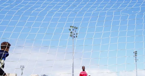 Goalkeeper misses a save in the field Stock Footage