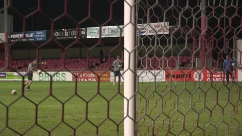 Goalkeeper warming up in front of goal. 動画素材 209919118