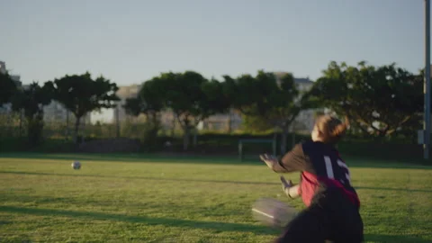 Goalkeeper warming up at sunset Stock Footage 279692747