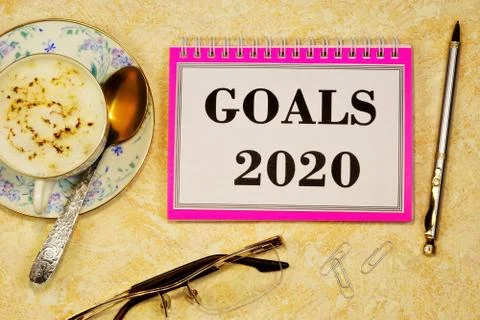 Goals 2020-writing text on a Notepad. Long-term vision of future actions Stock Photos