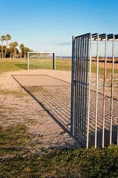 Goals on an empty soccer field next Les Gavines mediterranean beach in Cubell Stock Photos