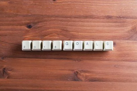 Goals for New Year 2018 on computer keyboard keys buttons on wooden background Foto stock