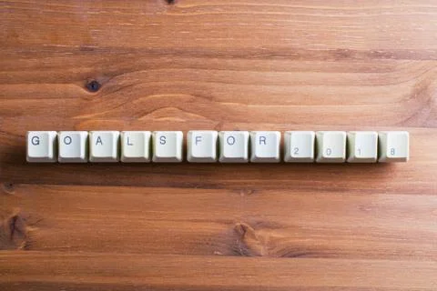 Goals for New Year 2018 on computer keyboard keys on a wooden background Foto stock