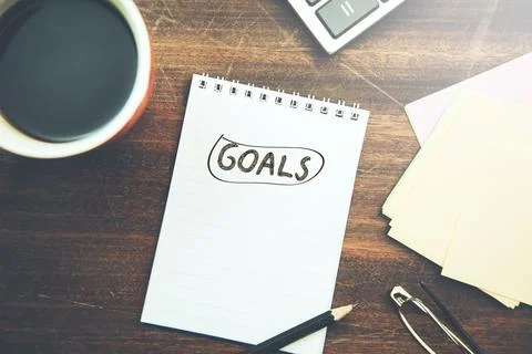 Goals text on notepad Stock Photos