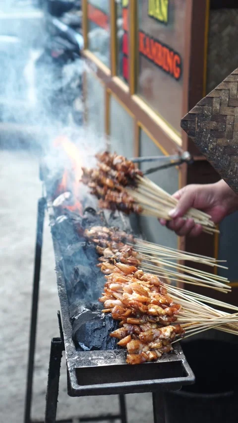 Goat satay being grilled Stock Footage 273228145