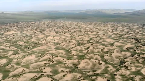 Gobi Desert dunes stretch across Mongolia with arid terrain - Empty Landscape Stock Footage 339399801