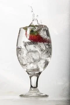 Goblet and ice cubes Stock Photos