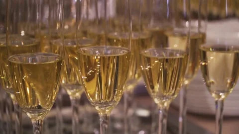 Goblets with sparkling wine and appetizers Stock Footage 80626183