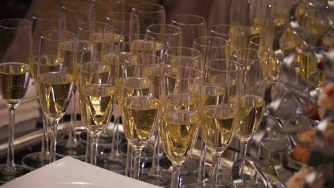 Goblets with sparkling wine and appetizers Stock Footage 80626282