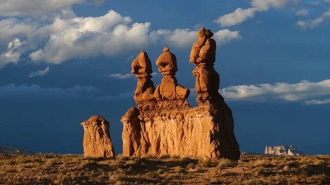 Goblin Valley, Utah Timelapse Clouds Three Sisters Rock Tower Time Lapse Stock Footage 98800603