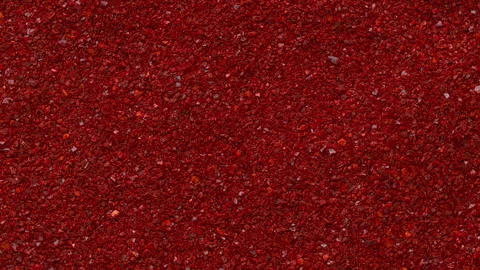 Gochugaru chili flakes full frame background texture rotating flat lay. Stock Footage 342276557