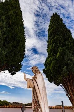 God blessing between two cypresses in the cemetery of Alhambra Stock Photos