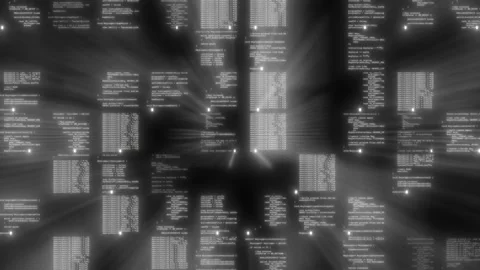 The God code. Rays of light pierce the code being created against a black Stock Footage 244661119