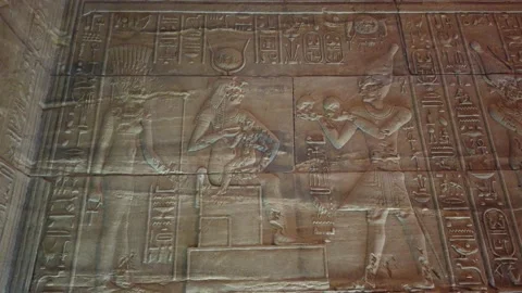 The god Isis while feeding from his mother in seated position. 動画素材 142975986
