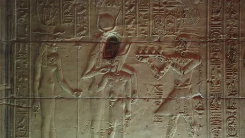 The god Isis while feeding from his mother. Stock Footage 142976063