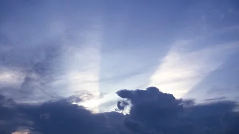 God rays, beams of light from behind clouds Stock Footage 301462037