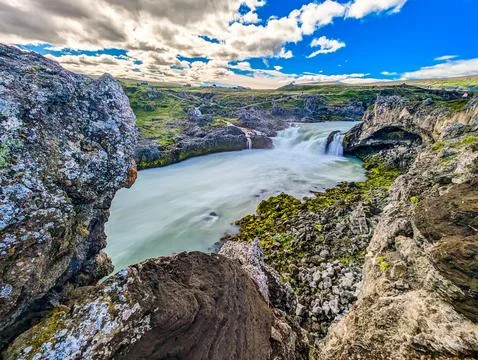 Godafoss waterfall with colorful sunset sky in summer at Iceland Stock Photos