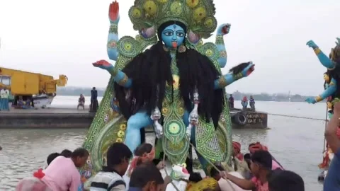 The goddess is being immersed in the Ganges in a manual process Stock-Footage 172390557