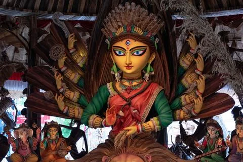Goddess Durga devi idol decorated at puja pandal in Kolkata, West Bengal, Ind Stock Photos