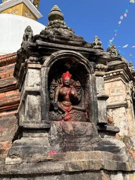 Goddess Hariti located inside a small temple-like structure Stock Photos