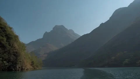 Godrays Piercing Through Polluted Air Over Ha Giang Mountains Stock Footage 302955808