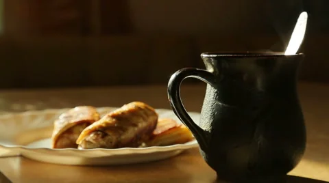 Goes the steam from hot tea, one cup Stock Footage 42755281