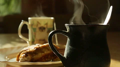 Goes the steam from hot tea, two cups Video stock 42755238