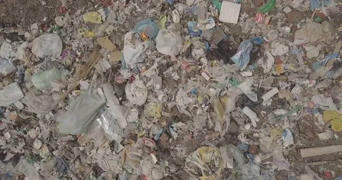 Going up above an lot of garbage in the dump Stock Footage 91041353