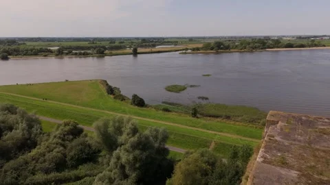 Going away top of Bunker Valentin to nearby field people walking Drone 4K Video stock 334232629