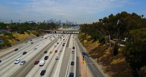 Going to city pushing in from freeway to city Stock Footage 114031860