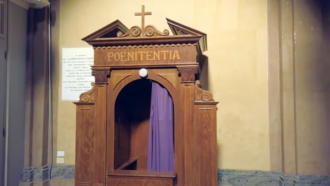 Going to confessional Stock Footage 126585420